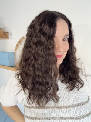 Darkhair curlyhair topper  made from natural hair. Ideal for alopecia, fine and thinning hair, or lack of density.