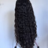 Volumateur capillaire bouclé en cheveux naturels chatains foncés. Idéal pour chute de cheveux. Solution chute de cheveux.