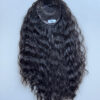Volumateur capillaire bouclé en cheveux naturels chatains foncés. Idéal pour chute de cheveux. Solution chute de cheveux.