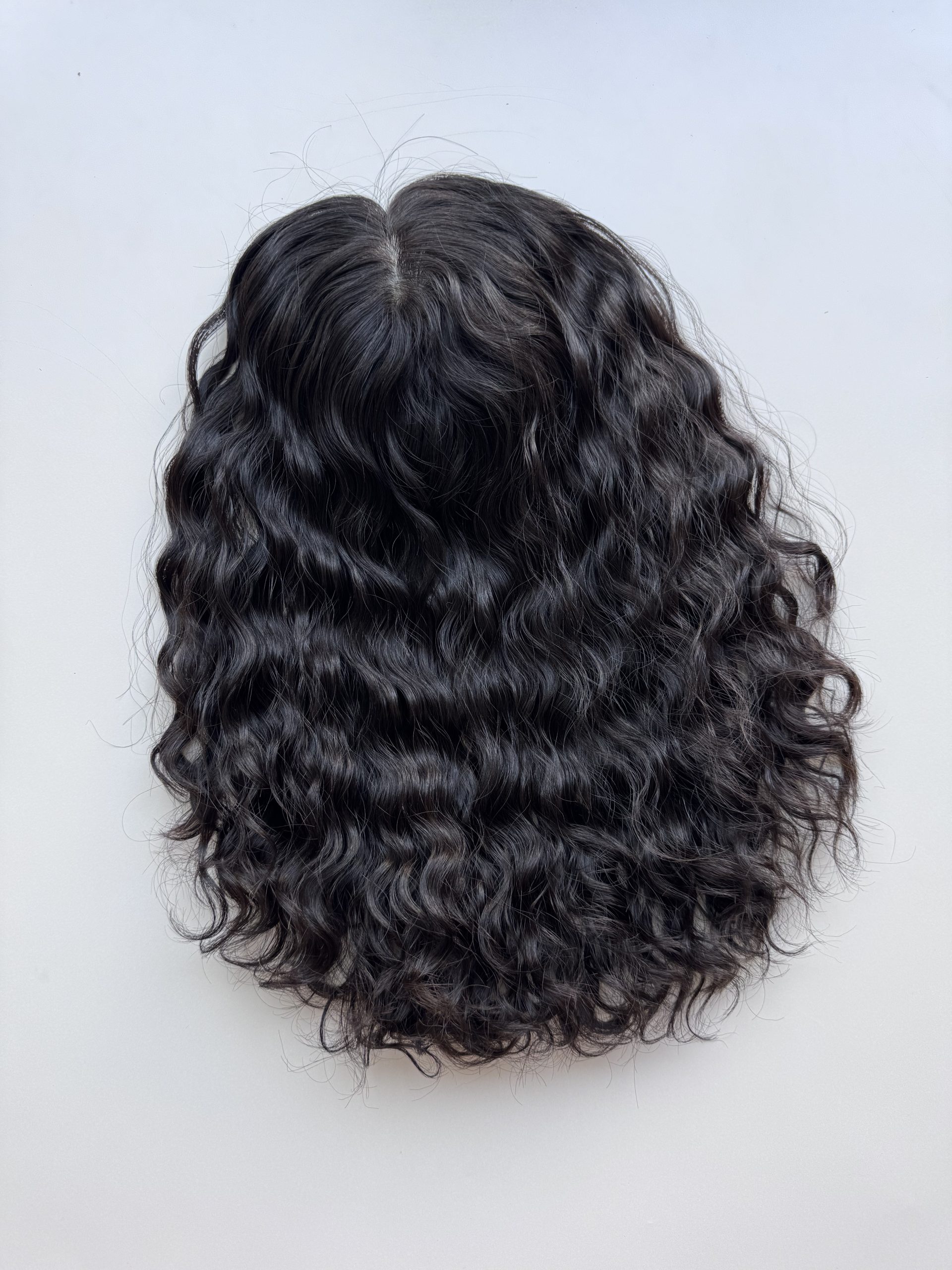 Dark Brown Curly Hair Topper made from natural hair. Ideal for alopecia, fine and thinning hair, or lack of density.