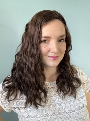 Dark chocolate brown hair topper with slight highlights, in Brazilian natural hair. Solution for hair loss, thinning hair.
